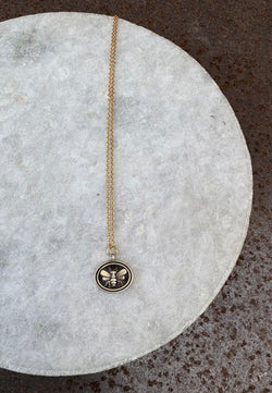 Tiny bee cast necklace