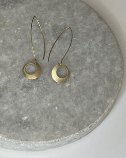 Off center circle drop earrings