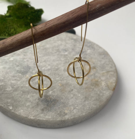 Kinetic small hoop within hoop earring on long wire