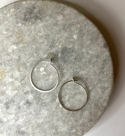 Simple hammered silver hoops