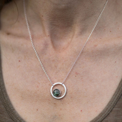 Silver circle pendant with Labradorite