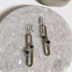 Kinetic long oval earrings with natural stone
