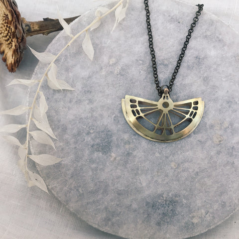 Moth wing domed necklace