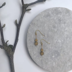 Small brass kinetic circle earrings on gold fill ear wire